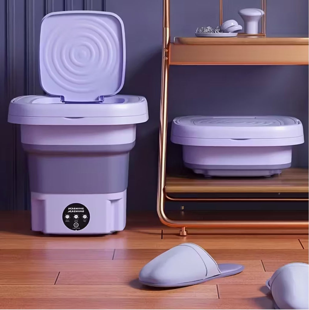 Order - اوردر compact folding washing machine in lavender and grey, collapsible design for small spaces, travel, or dorm rooms.
